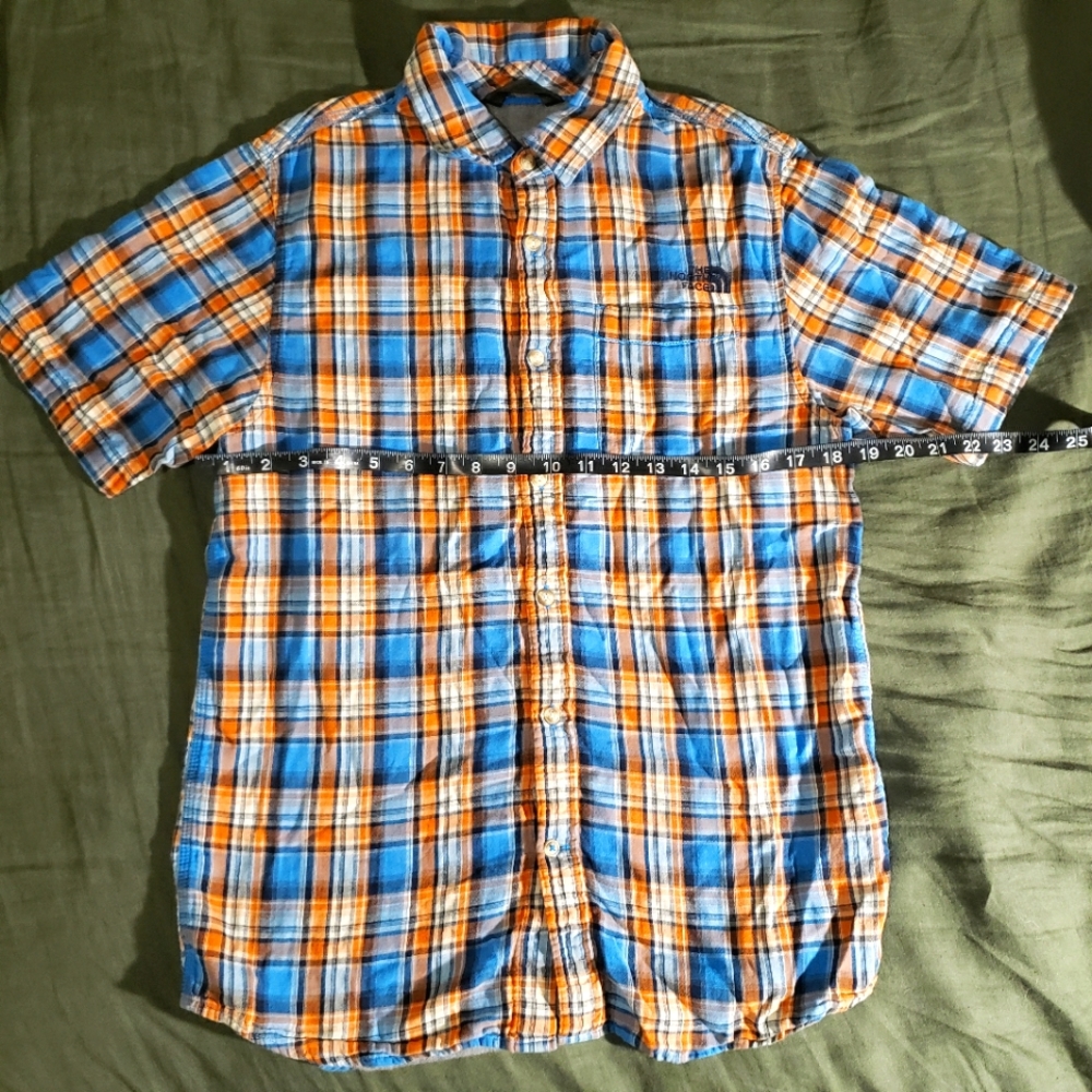 The North face small button up. Gray liner.